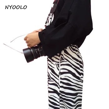 NYOOLO Vintage zebra prugasti uzorak Harajuku dizajn nalik na zonu slobodne svakodnevni izravni hlače žene / muškarci hip - hop hlače